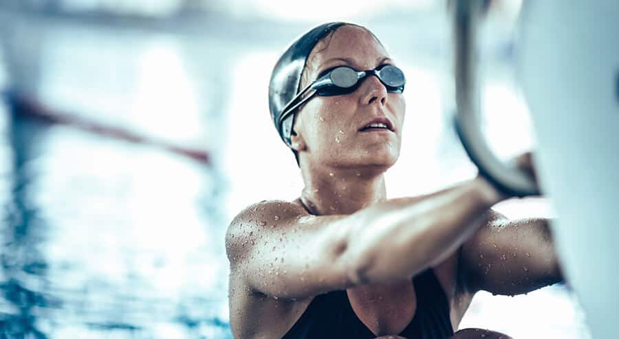 swimmer with ear protection