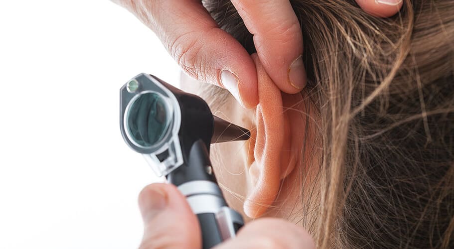 hearing assessment with an otoscope